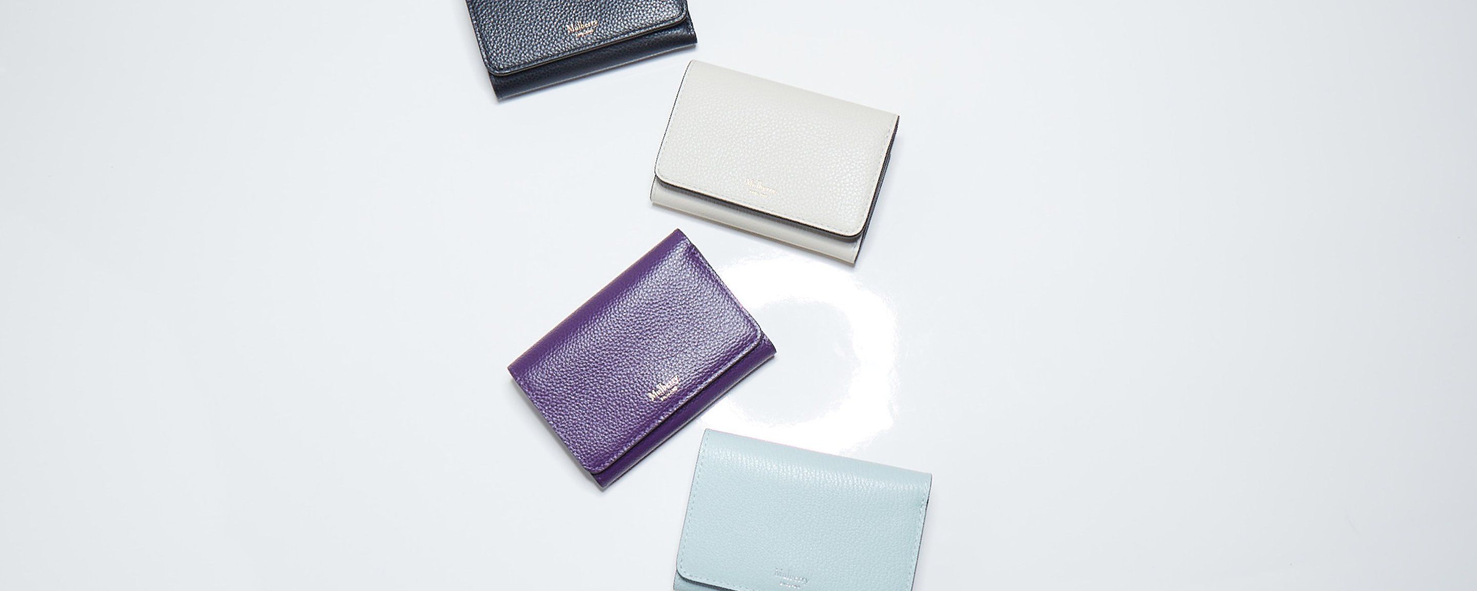 Mulberry continental wallets in black, grey, amethyst and cloud